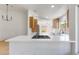 Bright kitchen with stainless steel appliances, hardwood floors, and white countertops at 2913 Hawksdale Dr, Las Vegas, NV 89134