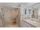 Bright bathroom features a tiled shower, vanity, and ample lighting at 3111 Bel Air Dr # 16D, Las Vegas, NV 89109