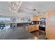 Open kitchen featuring granite counters, stainless steel appliances, and a breakfast bar with seating at 3111 Bel Air Dr # 16D, Las Vegas, NV 89109