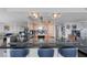 Open kitchen features granite counters, stainless steel appliances, and a breakfast bar with seating at 3111 Bel Air Dr # 16D, Las Vegas, NV 89109