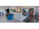 Spacious kitchen features granite counters, stainless steel appliances, and a breakfast bar with seating at 3111 Bel Air Dr # 16D, Las Vegas, NV 89109