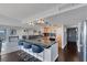 Open kitchen features granite counters, stainless steel appliances, and a breakfast bar with seating at 3111 Bel Air Dr # 16D, Las Vegas, NV 89109