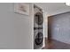 Convenient laundry area with stacked washer and dryer units, optimizing space and functionality at 3111 Bel Air Dr # 16D, Las Vegas, NV 89109