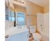 Bathroom featuring a combination shower and tub, a single sink vanity, and tile floors at 3743 Prairie Orchid Ave, North Las Vegas, NV 89081