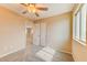 Bedroom featuring carpets, a fan and closet space at 3743 Prairie Orchid Ave, North Las Vegas, NV 89081