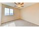 Bedroom with soft carpet and window at 3743 Prairie Orchid Ave, North Las Vegas, NV 89081