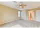 Bedroom with soft carpet and a fan at 3743 Prairie Orchid Ave, North Las Vegas, NV 89081