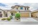 Charming two-story home features desert landscaping and a two-car garage at 3743 Prairie Orchid Ave, North Las Vegas, NV 89081