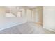 Spacious living room with new carpet, natural light, and tile entry at 3743 Prairie Orchid Ave, North Las Vegas, NV 89081