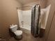 Bathroom with tub-shower combination and commode at 377 N 16Th St, Las Vegas, NV 89101