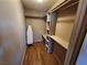 Walk-in closet with built-in shelving and wooden floors at 377 N 16Th St, Las Vegas, NV 89101
