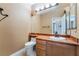 Bathroom featuring neutral colors, sink with marble countertop, and cabinets with modern hardware at 395 Suzanne Peak Ct, Henderson, NV 89012