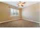 Bedroom with ceiling fan and a window at 395 Suzanne Peak Ct, Henderson, NV 89012