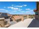 Outdoor rooftop patio showcasing the community with decorative railing at 395 Suzanne Peak Ct, Henderson, NV 89012