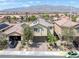 A beautiful suburban home with well-maintained landscaping, solar panels and a spacious three-car garage at 4050 Midnight Crest Ave, North Las Vegas, NV 89031