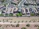 Nice aerial view of a neighborhood with well-kept lawns and landscaping at 4050 Midnight Crest Ave, North Las Vegas, NV 89031