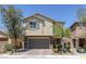Charming two-story home with stone accents and a well-maintained front yard at 4050 Midnight Crest Ave, North Las Vegas, NV 89031