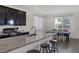 Well-equipped kitchen with granite countertops, stainless steel appliances, and ample cabinet space at 4050 Midnight Crest Ave, North Las Vegas, NV 89031