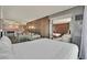 Open layout showing a chic living area connected to a stylish bedroom with modern accents and plush seating at 4381 W Flamingo Rd # 1101, Las Vegas, NV 89103