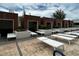 Pool area featuring private cabanas with lounge chairs, plants, and elegant patio, perfect for a relaxing retreat at 4381 W Flamingo Rd # 1101, Las Vegas, NV 89103