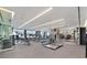 Spacious fitness center featuring modern equipment, natural light, and mirrored walls, perfect for a complete workout at 4381 W Flamingo Rd # 1101, Las Vegas, NV 89103