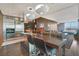 Contemporary kitchen featuring stainless steel appliances, a central island with bar seating, and an open-concept design at 4381 W Flamingo Rd # 1101, Las Vegas, NV 89103