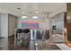 Sleek kitchen with modern stainless steel appliances, an island with seating, and chic pendant lighting at 4381 W Flamingo Rd # 1101, Las Vegas, NV 89103