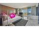 Luxurious main bedroom with a soaking tub, city views, and contemporary furnishings, providing a serene retreat at 4381 W Flamingo Rd # 1101, Las Vegas, NV 89103