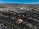 Aerial view of a densely populated area showcasing various rooftops and desert surroundings at 4607 El Camino Cabos Dr, Las Vegas, NV 89147