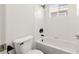 Clean bathroom with a white tiled shower-tub at 4607 El Camino Cabos Dr, Las Vegas, NV 89147