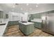 Spacious kitchen with new appliances, a large center island, and modern finishes at 4607 El Camino Cabos Dr, Las Vegas, NV 89147