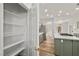 Walk-in pantry with generous shelving near kitchen at 4607 El Camino Cabos Dr, Las Vegas, NV 89147