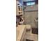 Nicely appointed bathroom with tile shower, vanity, and ample storage at 4690 E California Ave, Las Vegas, NV 89104