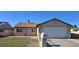 Charming single-story home featuring a well-maintained front yard and attached garage at 4690 E California Ave, Las Vegas, NV 89104