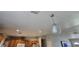 Open-concept kitchen with wood cabinetry, recessed lighting, and stainless steel appliances at 4690 E California Ave, Las Vegas, NV 89104