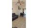 Open-concept living space with tile floors and a view of the dining area at 4690 E California Ave, Las Vegas, NV 89104