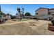 Large backyard space with mature tree and basketball hoop, perfect for entertaining at 4835 Nevada Ave, Las Vegas, NV 89104