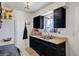 Functional kitchen with stainless steel sink and dark cabinets at 4835 Nevada Ave, Las Vegas, NV 89104