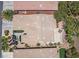 Aerial view of home showing roof and landscaped backyard with patio and seating at 5068 Rivedro St, Las Vegas, NV 89135