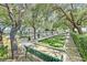 Bocce ball court surrounded by trees and landscaping; a recreational space for residents at 5068 Rivedro St, Las Vegas, NV 89135