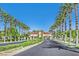 Impressive community entrance with palm trees and well-maintained landscaping at 5068 Rivedro St, Las Vegas, NV 89135