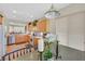 Bright kitchen area showcasing cabinets, modern appliances, and a breakfast nook with a view at 5068 Rivedro St, Las Vegas, NV 89135