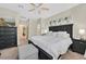 Serene main bedroom with a comfortable bed, soft lighting, and neutral decor at 5068 Rivedro St, Las Vegas, NV 89135