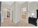 Bright main bedroom featuring neutral walls, carpet, and doorways leading to the bathroom and closet at 5068 Rivedro St, Las Vegas, NV 89135