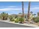 Beautiful single-story home with manicured front yard and mature palm trees at 5068 Rivedro St, Las Vegas, NV 89135