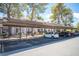 View of covered parking area near a multi-unit dwelling at 5241 Janfred Ct # 18, Las Vegas, NV 89103