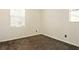 Bedroom with plush carpet and two windows, perfect for restful nights at 5380 Flowing Spring St, Las Vegas, NV 89122
