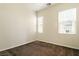 Bedroom featuring carpet floors and windows with blinds at 5380 Flowing Spring St, Las Vegas, NV 89122