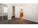 Bright bedroom leads to ensuite bath and mirrored closet, providing convenience and style at 5380 Flowing Spring St, Las Vegas, NV 89122