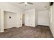 Large bedroom with ceiling fan, tv mount and closet, offering ample space at 5380 Flowing Spring St, Las Vegas, NV 89122